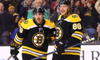 Boston Bruins F's David Pastrnak and Brad Marchand