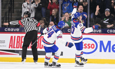 Bruins prospect James Hagens celebrating a goal at the IIHF World Junior Championships